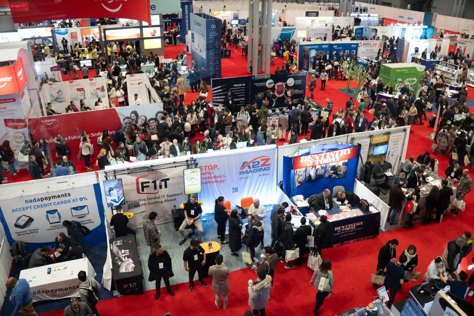 Crowds walking the exhibit floor of the Greater New York Dental Meeting trade show