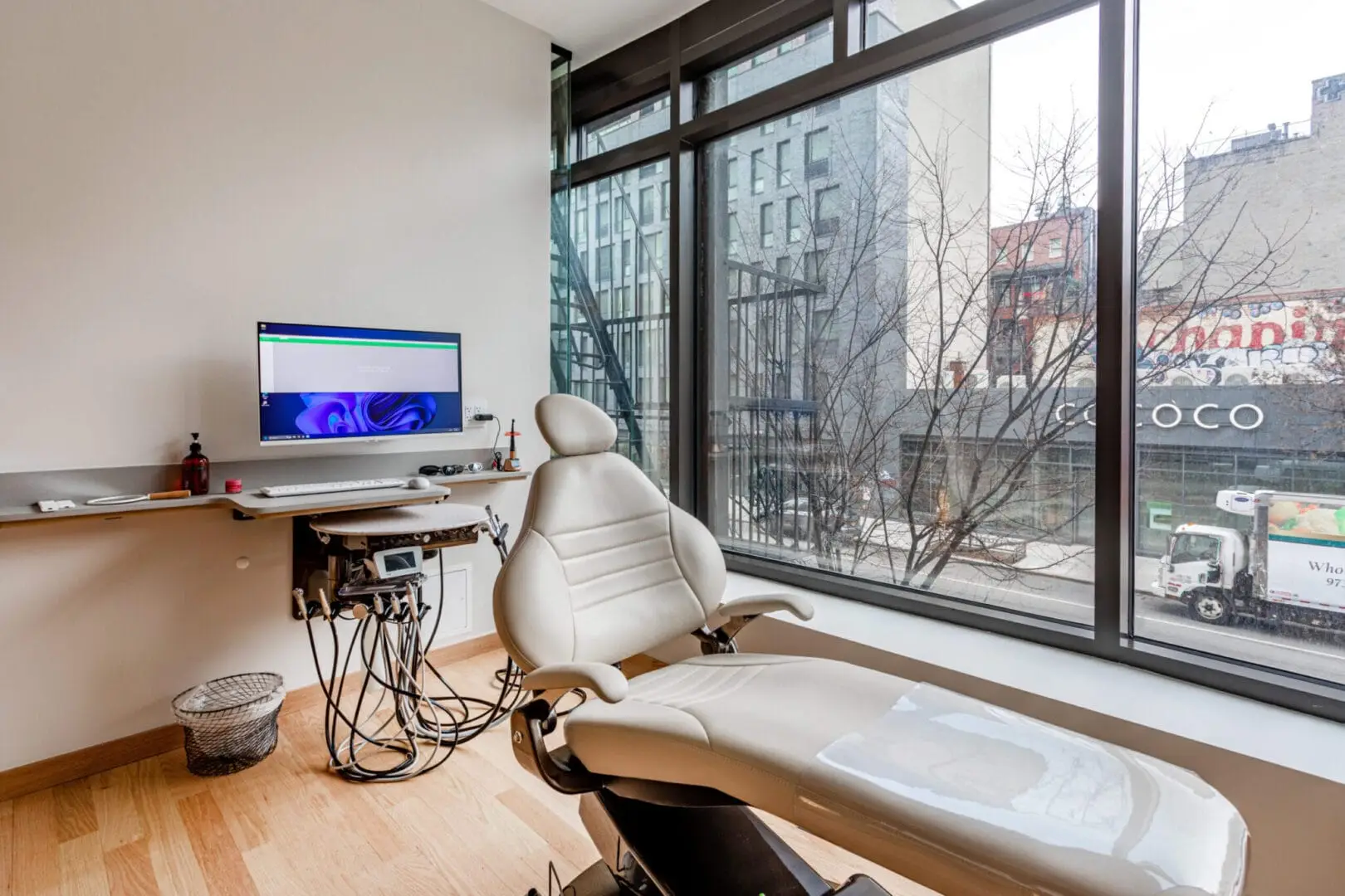 Dental operatory with chairside computer and imaging equipment at a modern practice